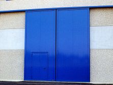 Portone Scorrevole a due ante, porta pedonale